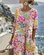 Linnen midi jurk dames met bloemenprint, korte mouwen en zakken