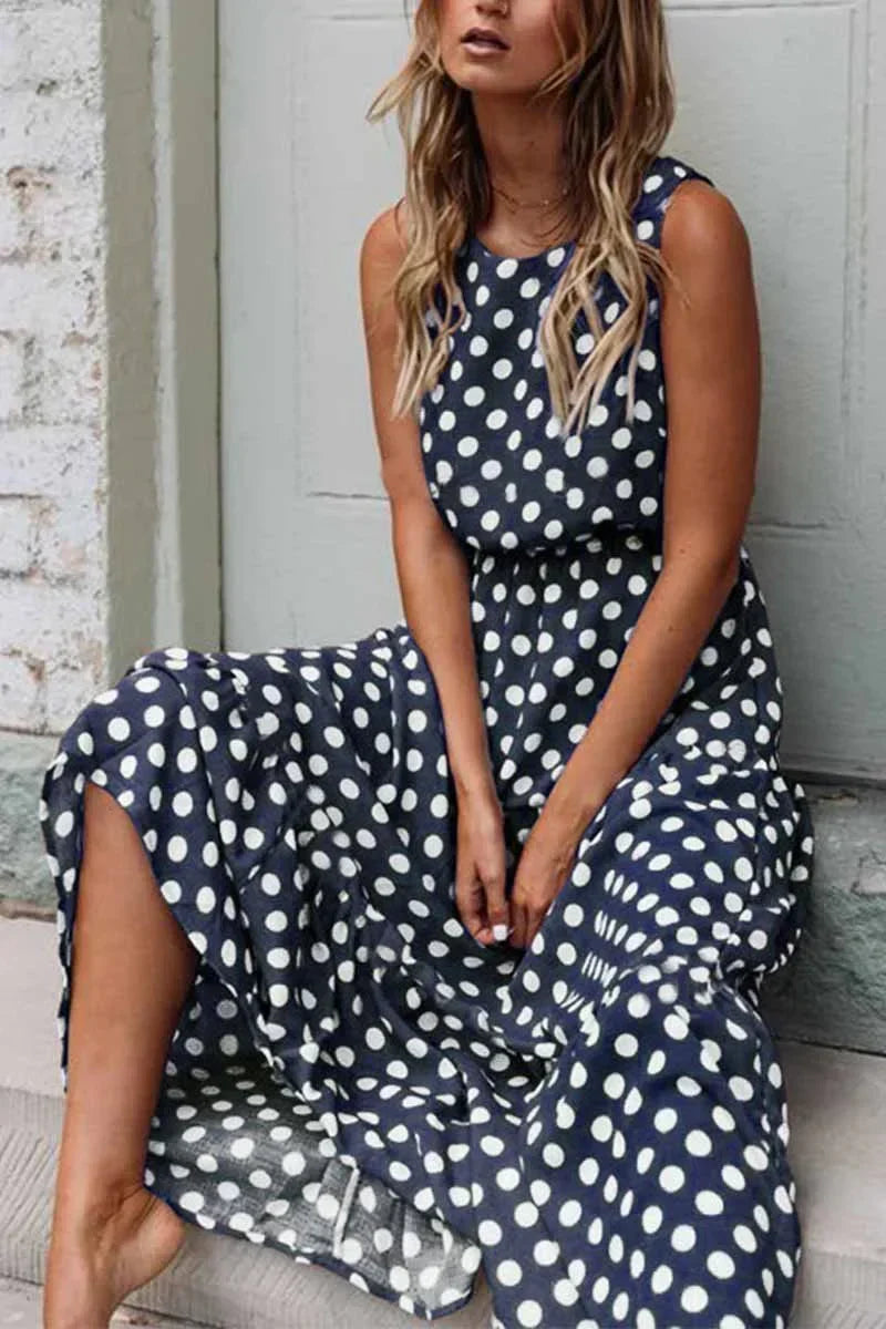 Mouwloze zomerjurk dames met stippen en midi-lengte