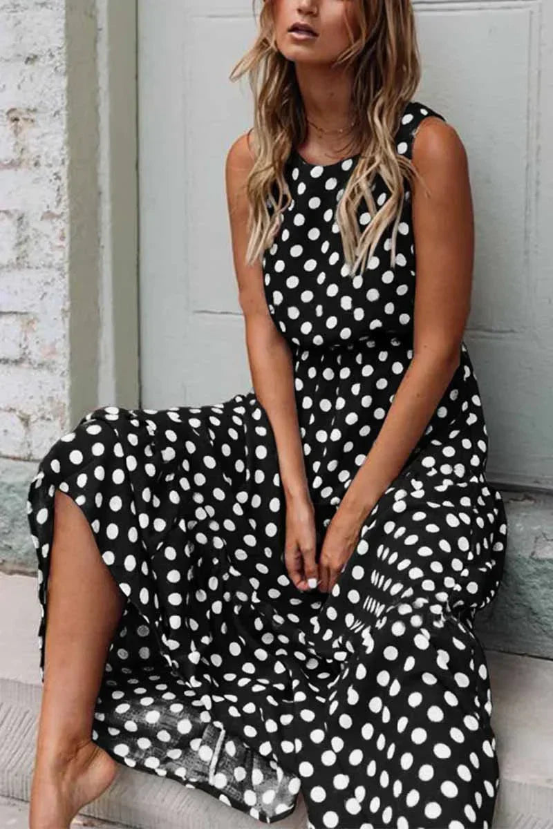 Mouwloze zomerjurk dames met stippen en midi-lengte
