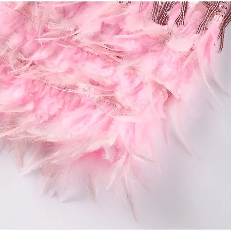 Manelle - Mini jurk met dunne bandjes, franjes en verenzoom dames