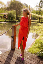 Mouwloze midi jurk dames met hoge hals en split
