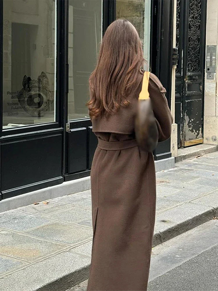 Lange trenchcoat dames met ceintuur, dubbele rij knopen en reverskraag voor herfst en winter 5