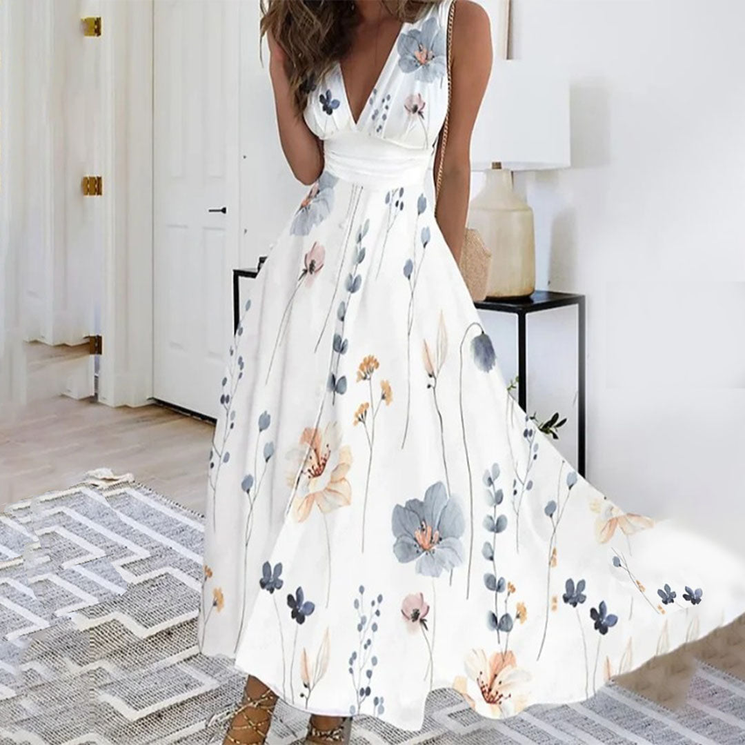 Iris - Luchtige maxi zomerjurk met diepe V-hals en bloemenprint dames