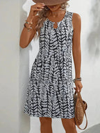 Midi zomerjurk dames, mouwloos met abstracte print en A-lijn