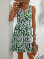 Midi zomerjurk dames, mouwloos met abstracte print en A-lijn