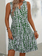 Midi zomerjurk dames, mouwloos met abstracte print en A-lijn