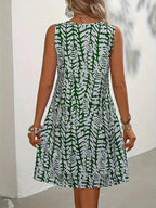 Midi zomerjurk dames, mouwloos met abstracte print en A-lijn