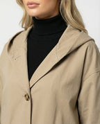 Lange jas dames met capuchon en knoopsluiting