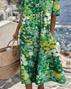 Linnen midi jurk dames met bloemenprint, korte mouwen en zakken