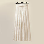 Driedelige gebreide set dames met coltrui, wijde broek en gilet 4