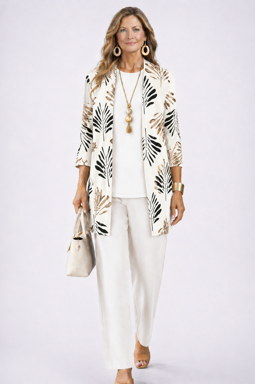 Driedelige set dames met top, broek en vest met print 4