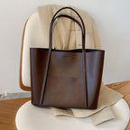 Maelyne - Leren handtas met handvat en ruime inhoud dames