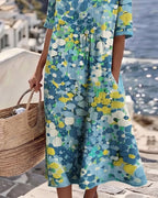 Linnen midi jurk dames met bloemenprint, korte mouwen en zakken