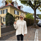 Kort gebreid vest dames met gouden knopen en oversized pasvorm