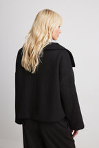 Korte trenchcoat dames oversized met brede revers en dubbele knooprij 5