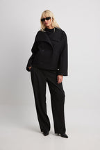 Korte trenchcoat dames oversized met brede revers en dubbele knooprij 6