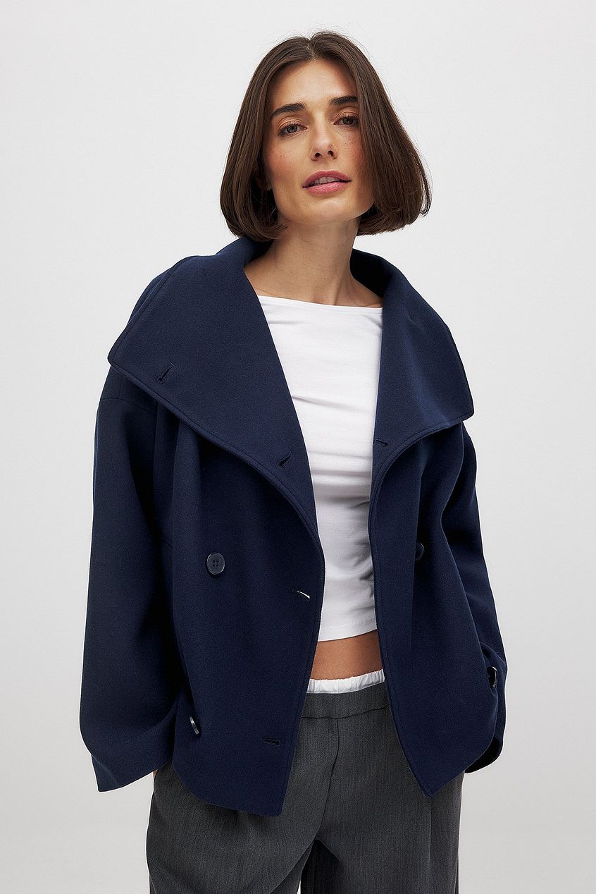 Korte trenchcoat dames oversized met brede revers en dubbele knooprij 8