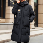 Lange winterjas dames oversized gewatteerd met capuchon 1