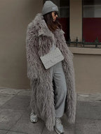 Lange winterjas dames van imitatiebont met lange mouwen 1