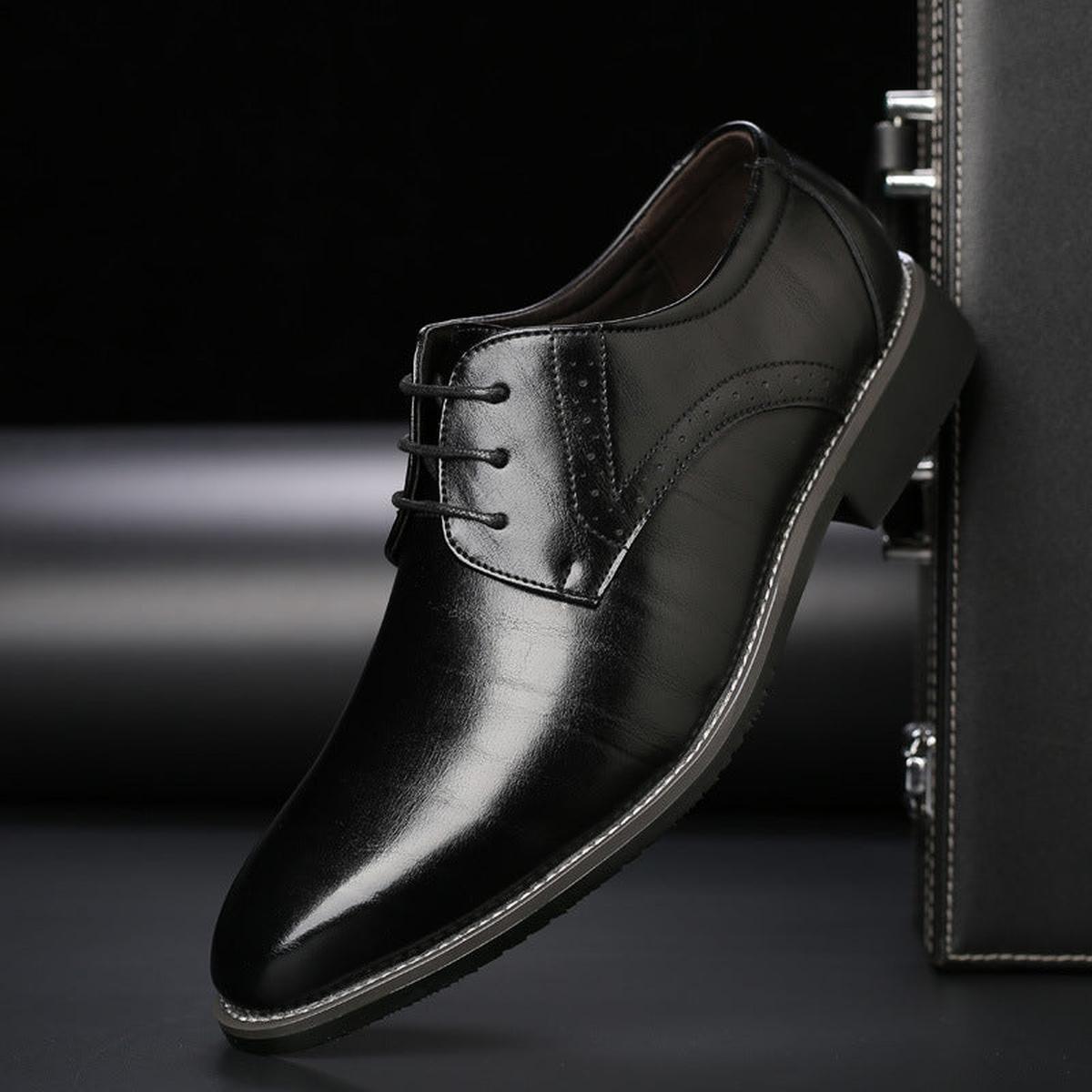 Nette schoenen heren van leer met geperforeerd brogue-detail 1
