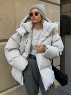 Oversized gewatteerde winterjas dames met capuchon en hoge kraag 1