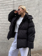 Oversized gewatteerde winterjas dames met capuchon en hoge kraag 4