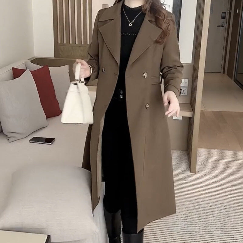 Lange trenchcoat dames met getailleerde pasvorm en klassieke kraag voor de herfst 4
