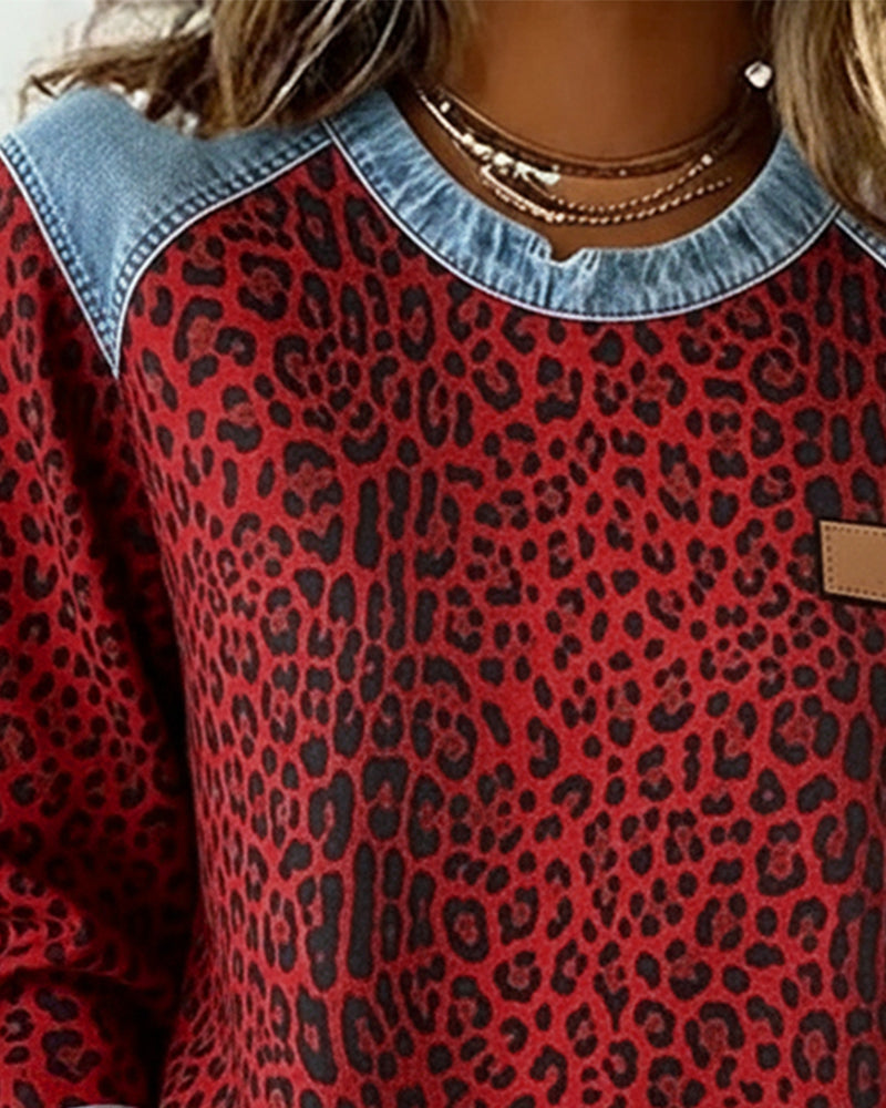 Sweater dames met luipaardprint en denim-look 8