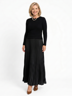 Tweedelige set dames met gebreide top en geplooide rok 1