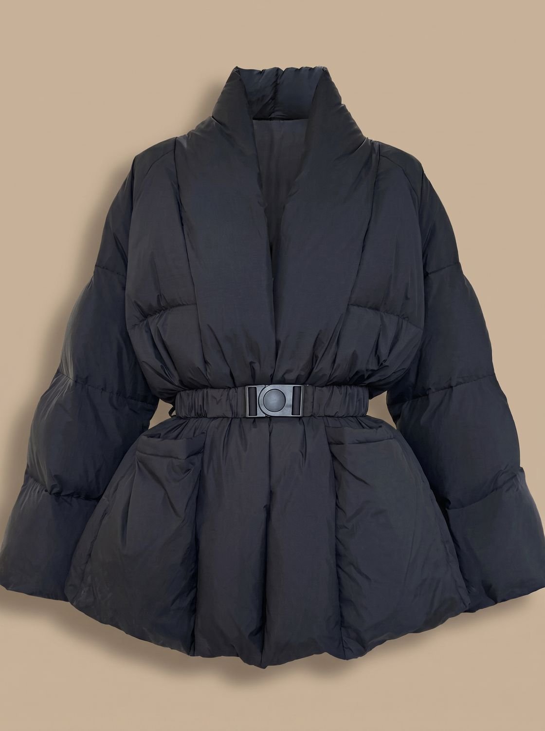 Winterjas dames oversized gewatteerd met ceintuur en opstaande kraag 1